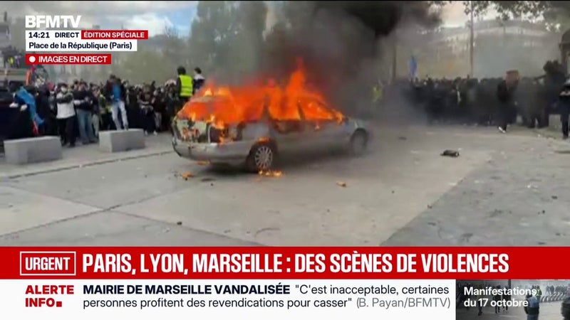 Manifestation du 17 octobre: une voiture en feu place de la République à Paris en marge du départ du cortège