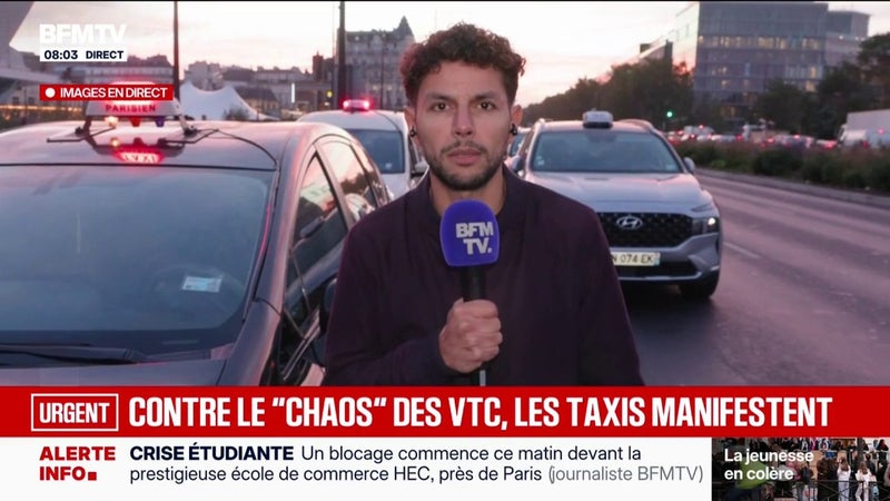 Les taxis manifestent à Paris contre la concurrence des VTC et la hausse du prix du carburant